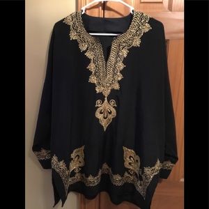Black tunic with gold embellishments